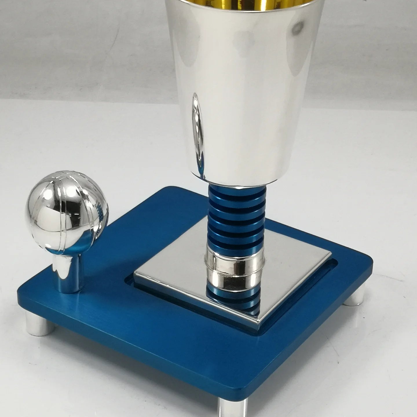 Silver basketball-themed Kiddush cup with a blue stacked stem, ball finial and cobalt square base